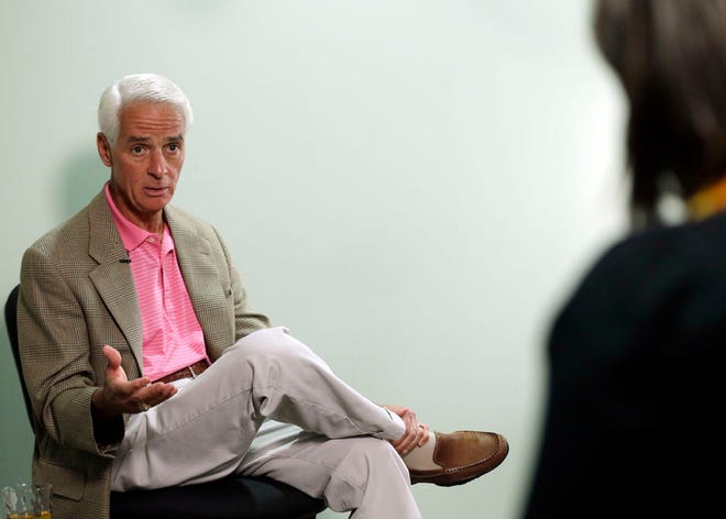 Democratic gubernatorial candidate Charlie Crist responds to a question as he sits for an interview with the Florida Associated Press staff, Tuesday, Sept. 30, 2014, in Miami.