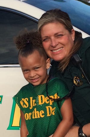 Destin Elementary School kindergartner Brooklyn C. is our first Books to Badges Volunteer Program "Junior Deputy for the Day" of this school year. As the Junior Deputy for the Day, the student spends one-one-one time with Deputy Sonya (the School Resource Officer) learning about her job in public service.