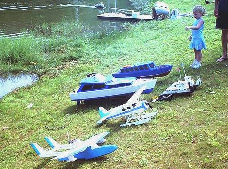 A collection of radio-controlled boats and airplanes at a recent ORCAS regatta.