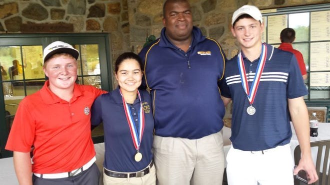 New Hope-Solebury had three players qualify for the PIAA state golf championship in York from Oct. 20-21. From left Hayden Rousselle, Nina Kouchi, coach Brian Demby and Roland Massimino.