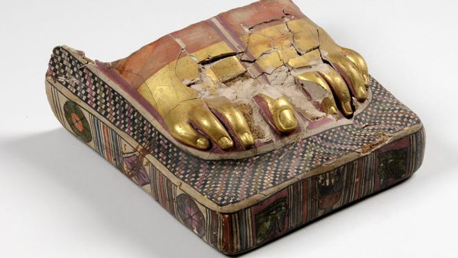 This foot cover once covered the feet of an Egyptian mummy. Images on the bottom of the cover represented dangers to the individual that would be trampled in the afterlife as the person walked. In the tomb of Tutankhamun, one of his pairs of sandals had enemies portrayed on the sole of each foot.