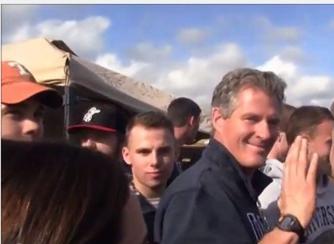 A screenshot from the video of U.S. Senate Republican candidate Scott Brown at UNH Homecoming on Saturday, where students made vulgar comments about Sen. Jeanne Shaheen.