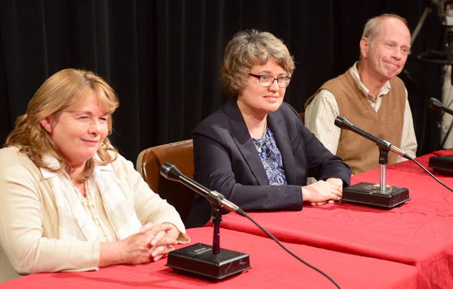 Jamestown School Committee candidates, from left, Sarah R. Baines, Melissa Ann Mastrostefano and Bruce J. Whitehouse listen to a question Tuesday from Newport Daily News Publisher William F. Lucey III.