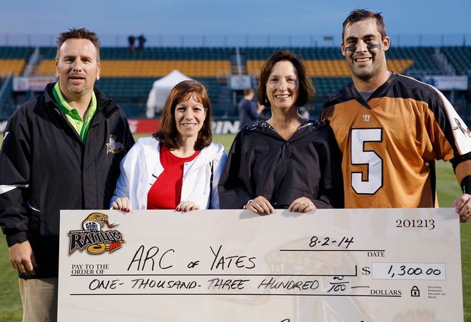 From left Brad Ford, Chief Operating Officer for the Rattlers, Annette Agness, Chief Financial Officer for the Arc of Yates, Terry Freeman, Executive Assistant for the Arc of Yates and Mike Manley, Rattlers Defenseman.