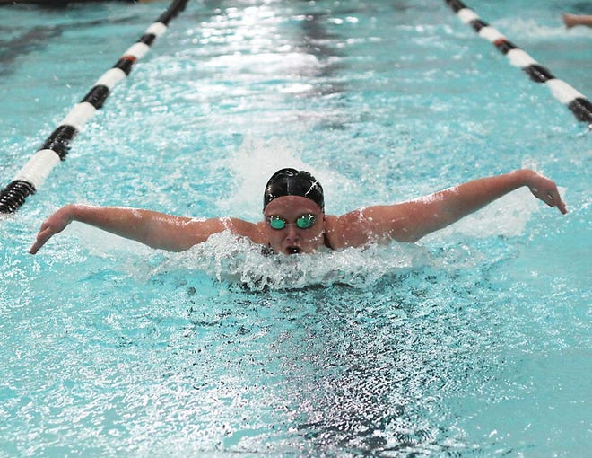 McKenzie Cain of Sturgis swims in the 100 butterfly Thursday.
