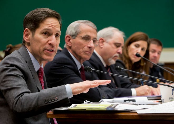 Centers for Disease Control and Prevention (CDC), Director Dr. Tom Frieden, far left, testifies as he sits on a panel with, from second from left,, Dr. Anthony Fauci, director of The National Institute of Allergy and Infectious Diseases, Dr. Robin Robinson, director of the Biomedical Advanced Research and Development Authority at the U.S. Department of Health and Human Service, Dr. Luciana Borio, assistant commissioner for counterterrorism policy at the U.S. Food and Drug Administration and John Wagner, the Acting assistant Commissioner at the Office of Field Operations for U.S. Customs and Border Protection, testify on Capitol Hill in Washington, Thursday, Oct. 16, 2014, before the House Energy and Commerce Committee's subcommittee on Oversight and Investigations hearing to examine the government's response to contain the disease and whether America's hospitals and health care workers are adequately prepared for Ebola patients. (AP Photo/Pablo Martinez Monsivais)