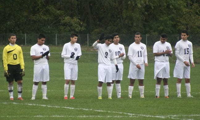 Starting lineups for the Monmouth-Roseville soccer team are announced prior to their opening regional game against Riverdale. JEFF HOLT/REVIEW ATLAS