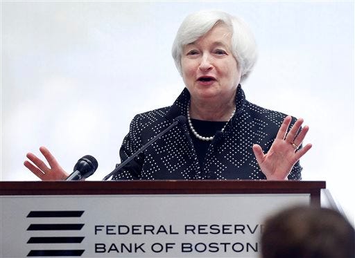 Federal Reserve Chairman Janet Yellen reacts as technicians work to resolve a computer problem during her speech at a conference on economic opportunity at the Federal Reserve Bank in Boston, Friday, Oct. 17, 2014. (AP Photo/Michael Dwyer)