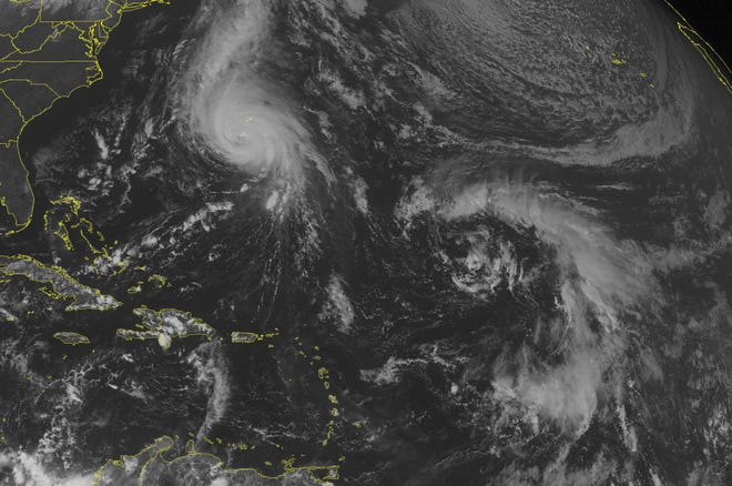 This NOAA satellite image Friday afternoon shows Hurricane Gonzalo approaching Bermuda, ready to make landfall in the late evening with strong winds, heavy rain and dangerous storm surge.