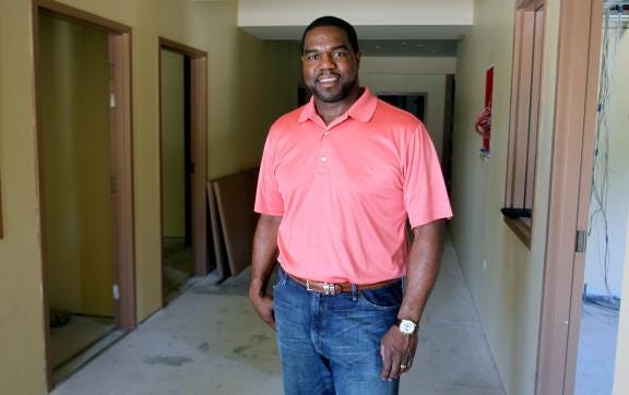 Michael Gullatte stands in the entryway of what will be the new homeless shelter in Shelby. (Star file photo)