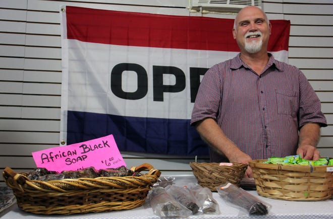 Thomas Brawley poses in his soap shop at the Waldo Farmer's and Flea Market on Saturday, Oct. 11, 2014 in Waldo, Fla. Brawley has been hand-making soap for three years.