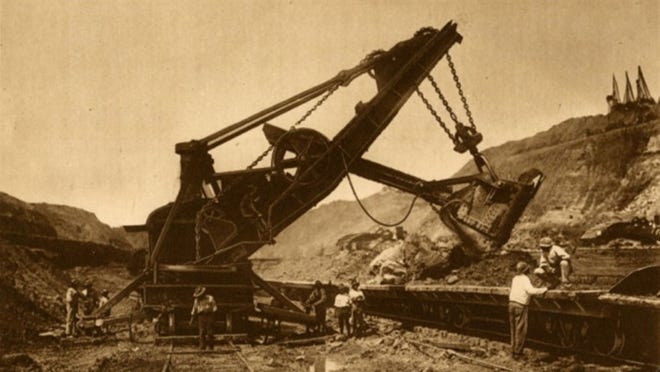 A giant steam shovel working on the Panama Canal, linking the Atlantic and Pacific oceans, is part of ‘Kiss of the Oceans,’ opening Oct. 10 at the Flagler Museum. ‘One shovel had a record of digging and loading 4,823 cubic yards of earth and rock in one day,’ according to the museum’s archives.