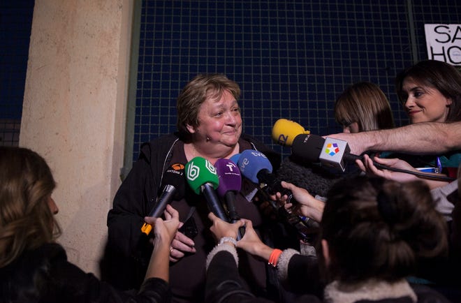 Teresa Mesa, spokesperson for Ebola patient Teresa Romero, speaks to journalists Sunday in front of the Carlos III Hospital in Madrid, Spain.