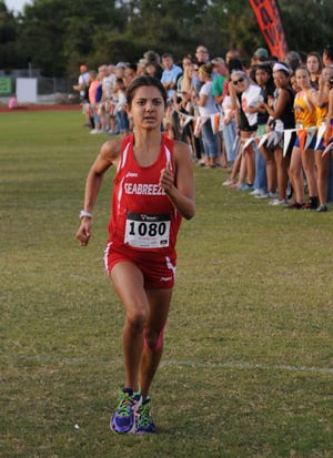 Seabreeze's Kianna Bonnet finishes first during the Five Star cross-county meet at Spruce Creek High School. Bonnet, who set her sights on the course record, finished more than half a minute ahead of the field.