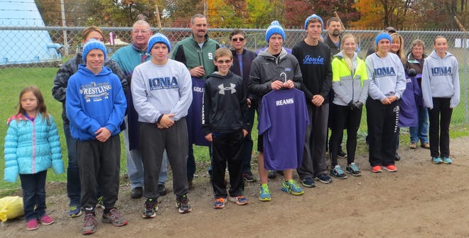 A jersey presentation was made Saturday by Ionia cross country runners with their sponsors, in recognition of cancer survivors, fighters and the taken.
