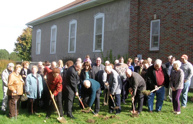 The congregation of the Church of Peace, 28358 N. 900 Ave., held a groundbreaking ceremony following the service Sunday morning on the west side of the building where a new addition will be built. Taking the first shovels of dirt were, from left, Mary June Kuster, president of the church board; Rev. Dan Craig, pastor; and building committee members Duane Heise, Bob Hepner, Bob Schaefer, Bob Bailleu (chairman) and Lola Charlet.