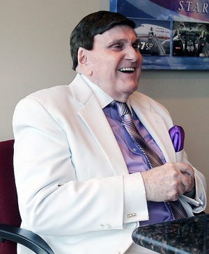 In this Sept. 3 photo, Rev. Ernest Angley flashes a smile during a interview in his office at Grace Cathedral in Cuyahoga Falls, Ohio. The Akron Beacon Journal reports that the Ohio televangelist advised church members not to have children, encouraged people to shun those who leave the fold and used free labor at his for-profit businesses. AP PHOTO/AKRON BEACON JOURNAL/PHIL MASTURZO