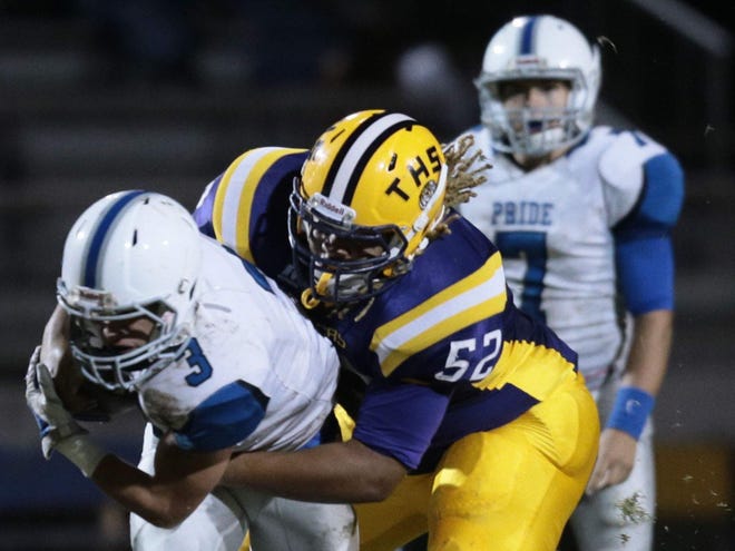 Thibodaux's Marquis Garman (52) tackles H.L. Bourgeois player Blaise Lecompte (3) during a recent District 7-5A game.