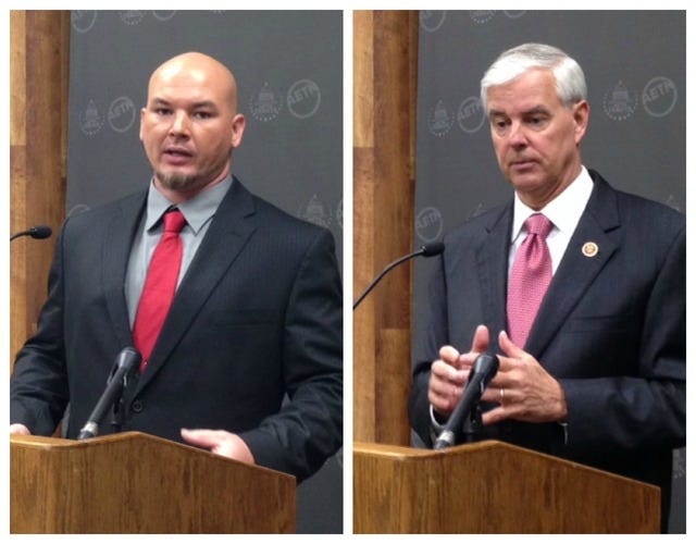 Photos by John Lyon • Arkansas News Bureau / Libertarian Grant Brand of Pea Ridge, left, and U.S. Rep. Steve Womack, R-Rogers, address the media Tuesday, Oct. 14, 2014, in Conway after a debate among candidates for the 3rd District congressional seat.