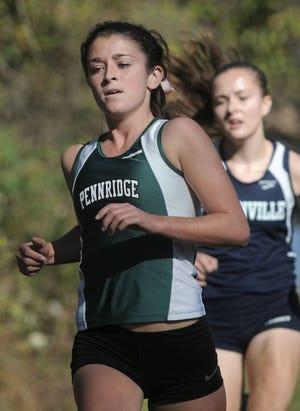 Pennridge's Marissa Sheva leads the pack in the 2014 District One Class AAA cross country championships at Lehigh University in Bethlehem.