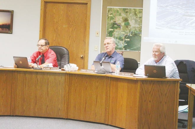 Devils Lake Mayor Dick Johnson, left, and commissioner members Craig Stromme, middle, and Tim Heisler, right, discuss Ordinance 923. The ordinance amends the current policy and bans the sale and use of e-cigarettes for minors. It takes effect Nov. 1.
