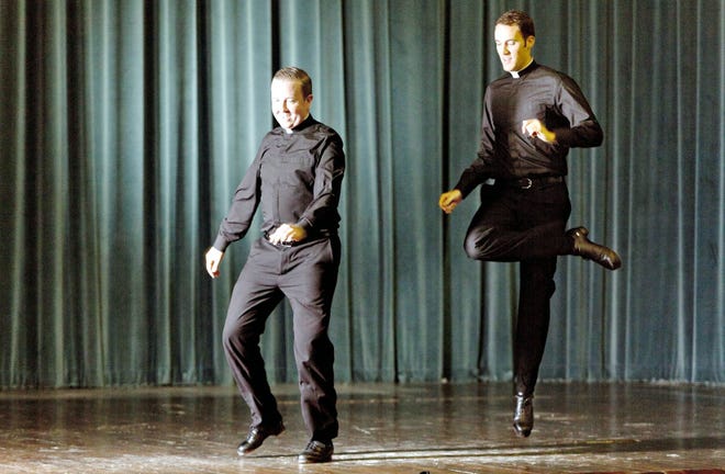 Father David Rider, left, and father John Gibson dance before an interview with the Associated press at the Pontifical North American College in Rome on Oct. 13. A video of a pair of dueling, dancing American priests studying in Rome has gone viral, following in the footsteps of a now-famous Italian nun whose Alicia Keyes-esque voice won her a singing contest and a record contract. The Rev. David Rider of Hyde Park, New York and the Rev. John Gibson of Milwaukee first shot to Internet fame when they were filmed during a fundraiser at the North American College, the elite American seminary just up the hill from the Vatican. AP PHOTO/DOMENICO STINELLIS