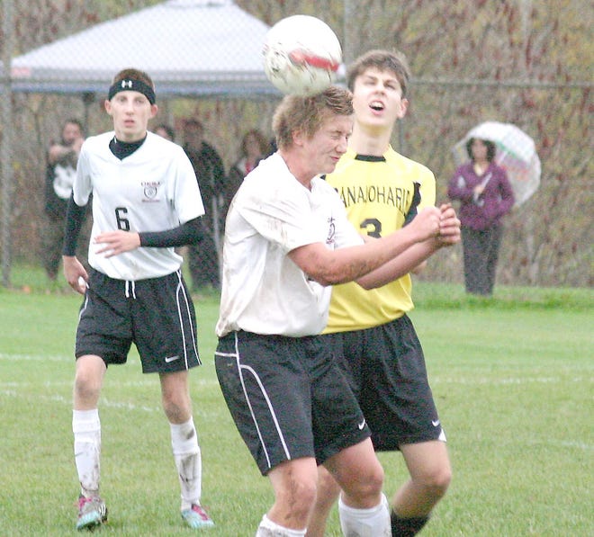 Oppenheim-Ephratah-St. Johnsville Wolf Andrew Hart heads the ball away from a Canajoharie player late in the second half of Wednesday’s sectional playoff match. 



Times Photo/Jon Rathbun