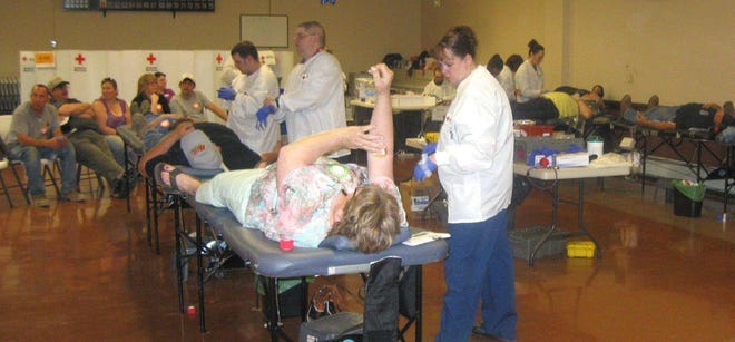 Donors give blood during a blood drive. Photo provided