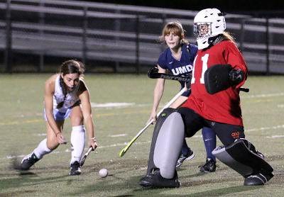 Liz St. Germaine comes out of net to make a play on the ball. COURTESY UMASS DARTMOUTH