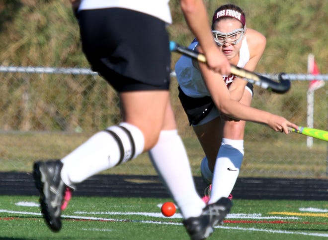 Portsmouth High School's Lilly Hardy looks to pass to a teammate during a Division II field hockey game against St. Thomas Aquinas in Portsmouth. Ioanna Raptis/Seacoastonline