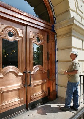 Three sets of copper-plated wooden entryways at the Capitol, which cost $670,000, were cited in the “divine detail” category. File/The State Journal-Register