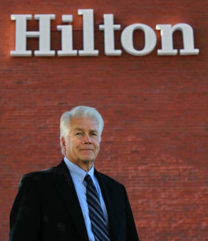 Portrait of Rennick Andreoli, president of the RDA Hotel Management Co., taken at the Hilton Inn in Fairlawn, of which he is the owner. Andreoli, a longtime hotelier who is involved in many philanthropic activities, is the winner of this year's Bert A. Polsky Humanitarian Award. (Ed Suba Jr./Akron Beacon Journal)