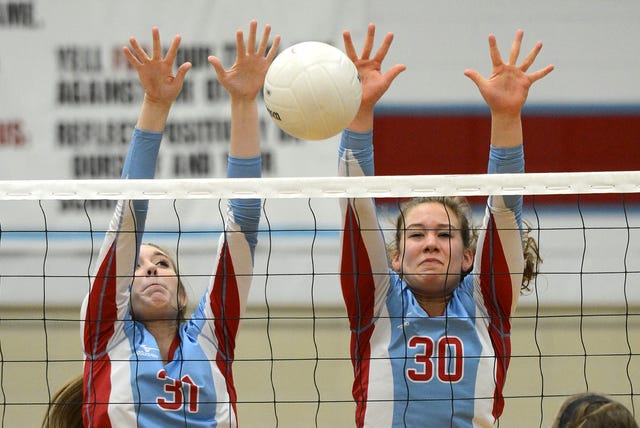 BRIAN D. SANDERFORD • TIMES RECORD Southside's Madison Teal, left, and MacKenzie King block a Siloam Springs shot on Thursday, Oct. 23, 2014 at Southside. 
 BRIAN D. SANDERFORD TIMES RECORD Southside's MacKenzie King, right, hits as Siloam Springs' Arika Johnson attempts to block during the second set on Saturday, Oct. 4, 2014 at Southside. 
 BRIAN D. SANDERFORD • TIMES RECORD Southside's MacKenzie King, right, hits a kill shot as Fayetteville's Haley Warner attempts to block during the first set on Thursday, Oct. 16, 2014 at Southside.