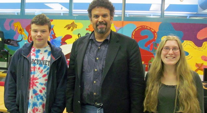 Author Neil Shusterman (center) recently visited Winnacunnet High School to talk writing. Here he is with freshman Corey Woodsum and senior Terri Duhamel.

Photo by Lisa Tetrault-Zhe