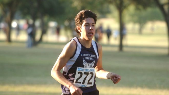 Hendrickson sophomore Daniel Viegra runs across the finish line at the District 13-6A Cross Country Meet on Oct. 24 at Old Settlers Park. Joe Harrington/ PFLUGERVILLE PFLAG