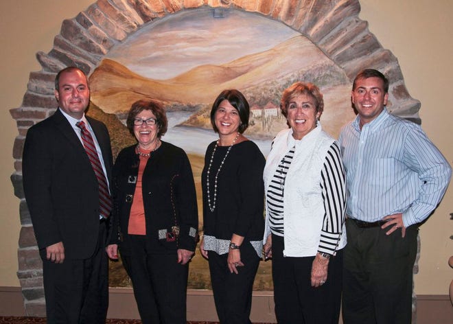 Standing, from left: Fred Rinaldi, event co-chair; Elaine Shepard, event chair; Moscow resident Michele Margotta Neary, event co-chair; Jessup resident Alice Vanston, restaurant committee chair; and Rich Bradshaw, executive director, Ronald McDonald House of Scranton.