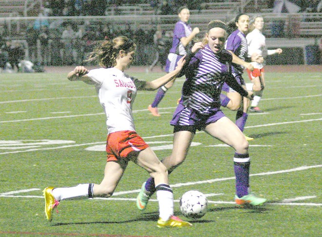 A West Canada Valley defender tries to cut off the path of Sauquoit Valley Indian Adrianna Grande (left) during the second half of Saturday’s match. 



Times Photo/Jon Rathbun