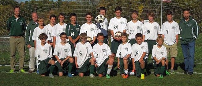 The Dover Middle School boys soccer team went 9-2-1 this past season. The includes in the front, from left, Will Weete, Reece James, Sam Haas, Max Casey, Tobey DiMambro, Ryan Long, Sebastian Roland, (back) coach Matt Johnson, coach Ben Larkin, Zachary Nelson-Marois, Jaidan Hayes, Ian Krause, Jacob Carey, Sean O’Doherty, Kieran Licata, Andrew Housley, Sam Faasen, Andrew McCammon, Evan Dodier, and coach Scott Dodier. Missing: Christopher Johnson. At a recent season ending celebration dinner, the following awards were presented: Most Improved Player to Andrew McCammon; Most Versatile Player to Sean O’Doherty; Coaches’ Award to Sam Faasen; Most Valuable Player to Kieran Licata.