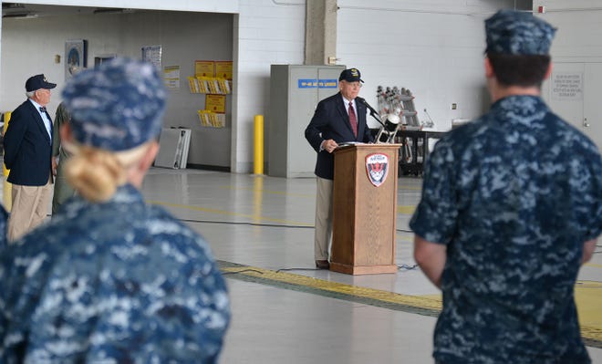 Retired Capt. Benjamin Folsom, a naval aviator who served with the War Eagles from 1966-1968, addressed current Sailors attached to VP-16 during the squadron's bi-weekly awards quarters.
