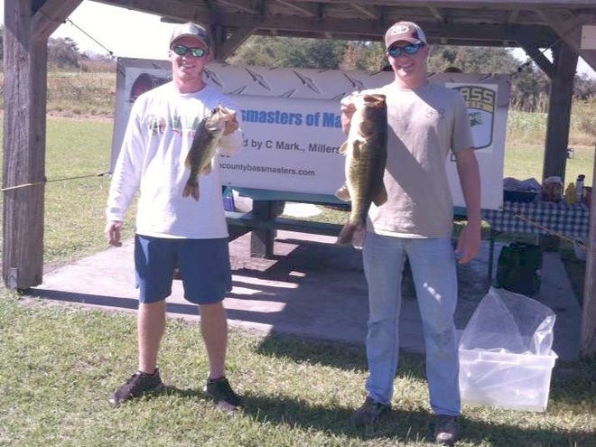 Trenton Penuel, left, and Beau Clymer won the high school division of the Junior Bassmasters of Marion County season-ending classic on the Rodman Reservoir. (Submitted photo)
