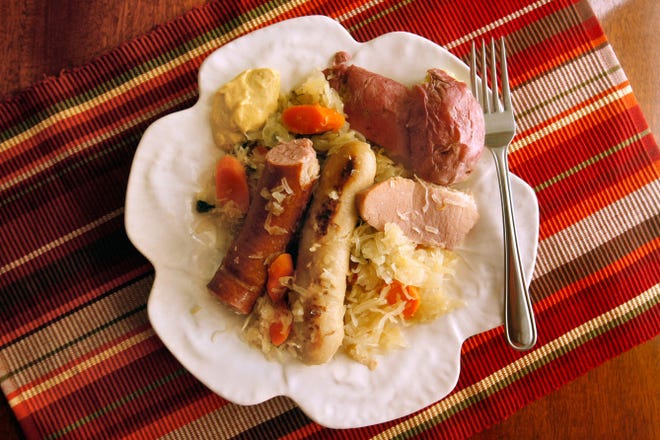 Sauerkraut braised with sauages - Chourcroute Garnie - is a signature dish of Alsace, a region of blended cultures and cuisine.