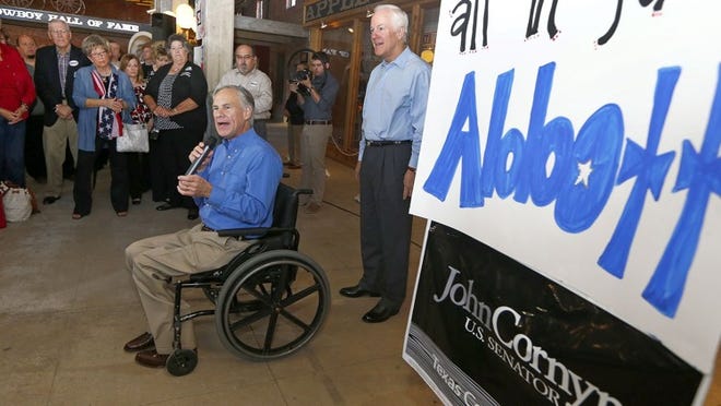 Republican gubernatorial candidate Greg Abbott, left, is joined Wednesday by U.S. Sen. John Cornyn in Fort Worth.