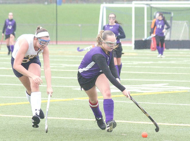 Little Falls Mountie Sydney McCarthy (right) advances the ball along the sideline during the second half of Sunday’s Section III playoff game against Cazenovia. 



Times Photo/Jon Rathbun