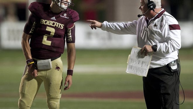 Texas State quarterback Tyler Jones, talking with head coach Dennis Franchione during a loss to Louisiana-Lafayette on Oct. 14, has passed for nearly 1,500 yards this season, including 14 touchdown tosses. On Saturday, Jones and the Bobcats play at New Mexico State.