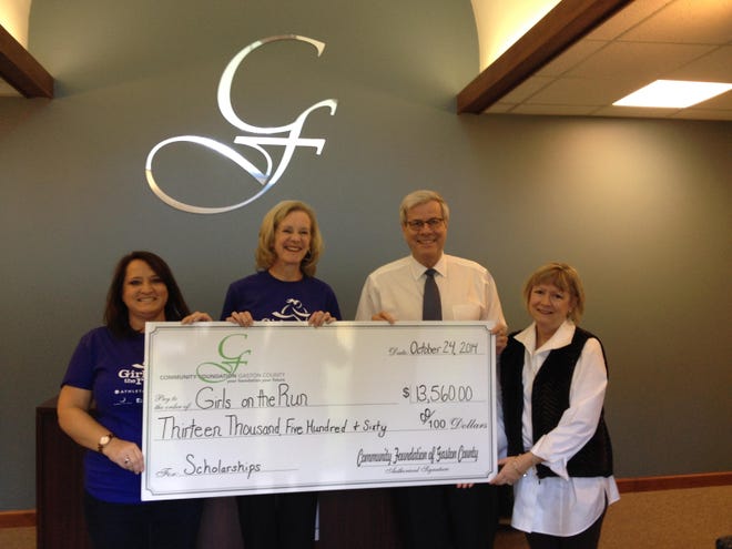Pictured, from left, are Anne Mallonee, volunteer coordinator, Girls on the Run of Gaston County; Kathleen Boyce, council director, Girls on the Run of Gaston County; Ernest Sumner, executive director, Community Foundation of Gaston County; and Janet Spencer, donor development coordinator, Community Foundation of Gaston County.