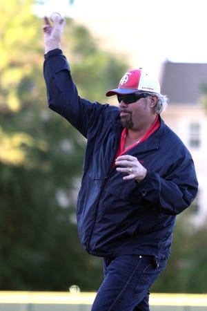 Country singer Toby Keith of Moore throws out the first pitch during the second annual ALS Awareness Halloween game Thursday night at L. Dale Mitchell Park on the OU campus in Norman.. Photo by Hugh Scott, for The Oklahoman