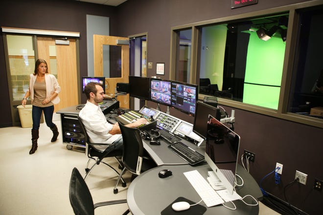 MCTV Access Coordinator Leslie Zules and Executive Director Jon Grabowski, busy preparing the main studio and control room for production at MCTV.

Wicked Local Staff Photo/Chris Bernstein