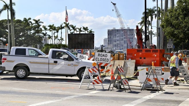 Construction work along the Flagler Memorial Bridge Oct. 30, 2014, in Palm Beach. The bridge will reopen November 1st. (Bill Ingram / Palm Beach Post)Beach Post)