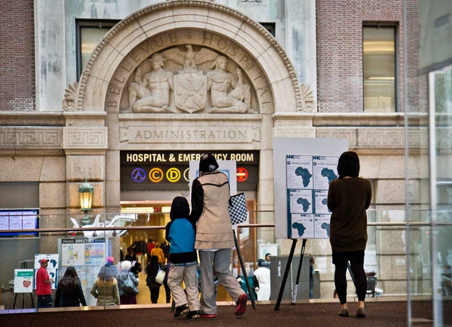 Associated Press file photoHealth alerts regarding people who may have traveled to particular West African countries are posted in the main lobby entrance of Bellevue Hospital last month in New York.