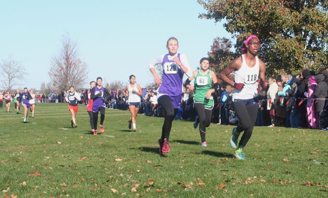 Momouth-Roseville sophomore Dyesha Taylor competes Saturday at the Elmwood Girls Cross Country Sectional. Taylor and the Titan girls team advanced to State, as well as M-R's Nathan Ault and Jesus Corrales.  JEFF HOLT/REVIEW ATLAS